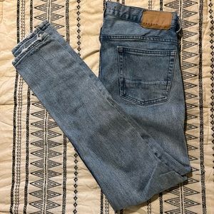 Blue skinny jeans from PacSun.